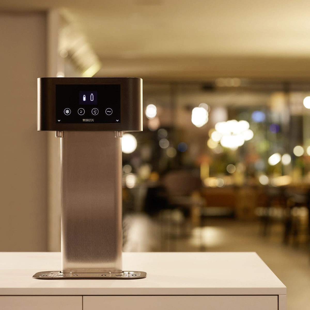 BRITA Fill T-Tap on a counter in a restaurant setting.